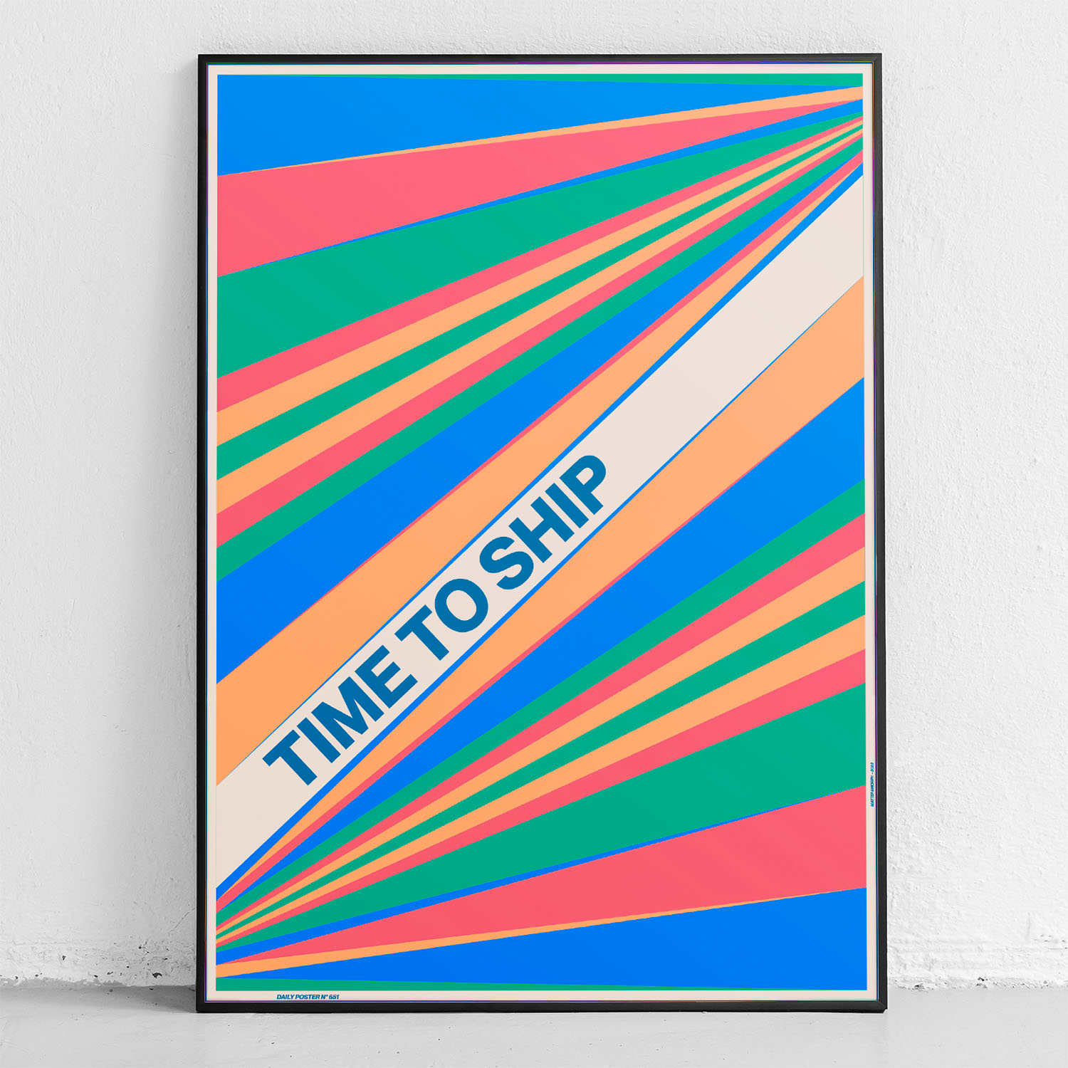 framed poster "time to ship" in front of wall